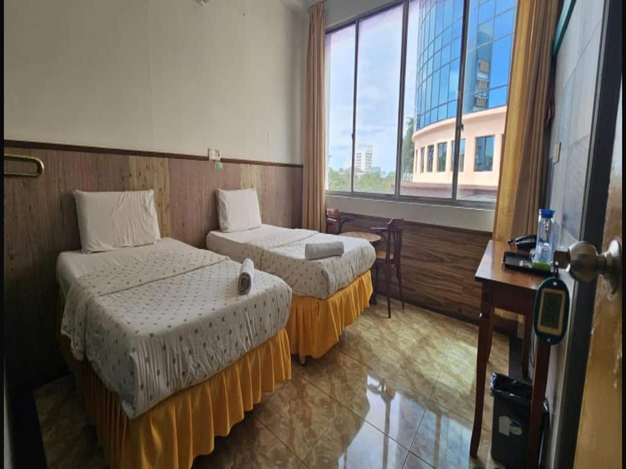 Oyo 90979 Sianglory Inn Kota Kinabalu Bagian luar foto