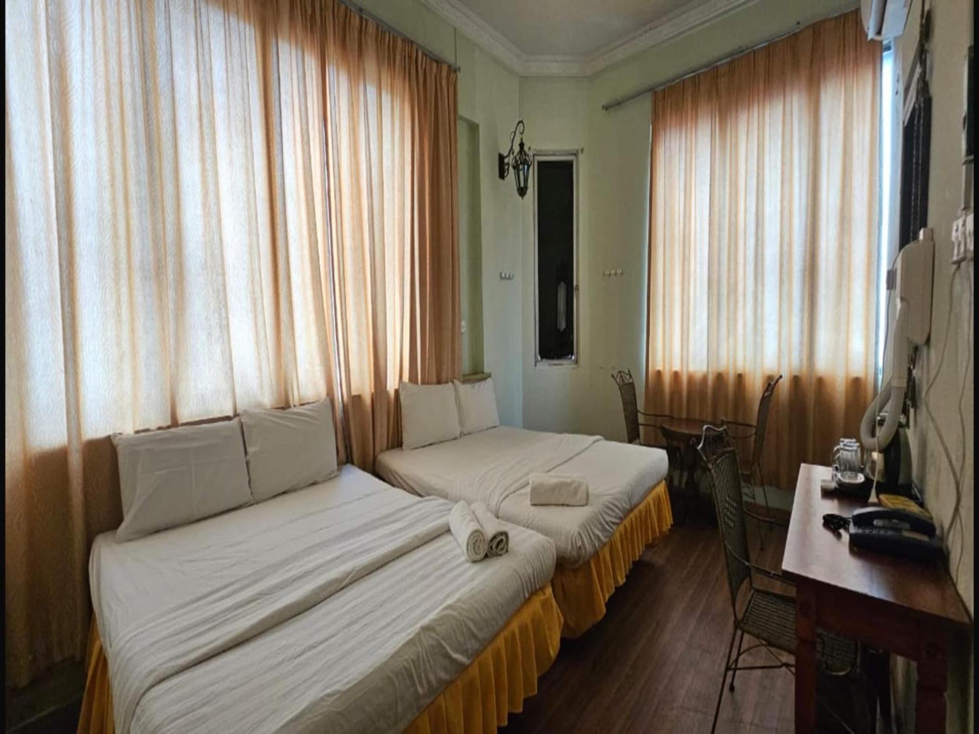 Oyo 90979 Sianglory Inn Kota Kinabalu Bagian luar foto