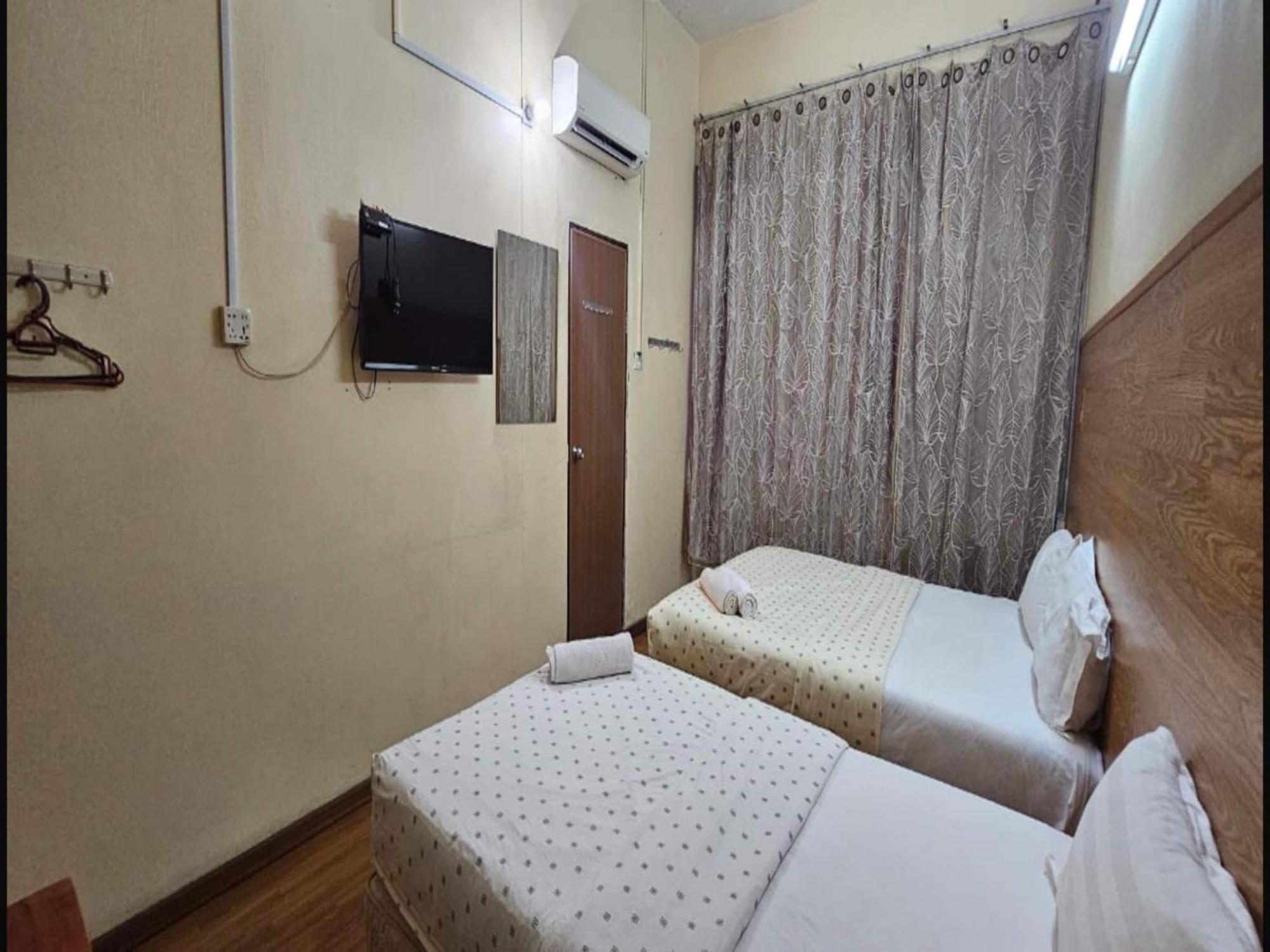 Oyo 90979 Sianglory Inn Kota Kinabalu Bagian luar foto